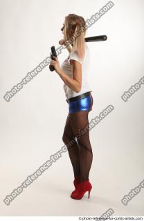 NIKOL WITH BASEBALL BAT AND GUN